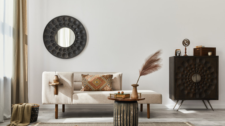 neutral walls with round mirror