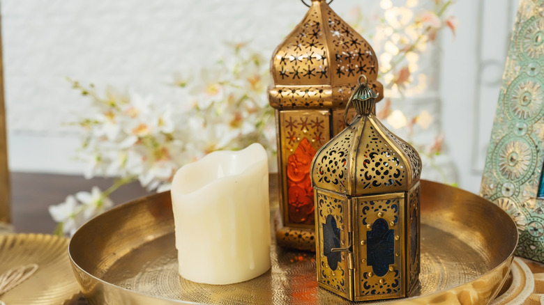 gold tray with candle