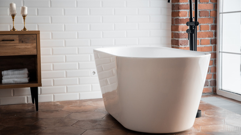white tile and bathtub