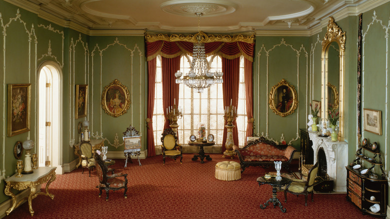 Victorian sitting area with green walls