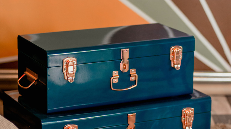 stacked vintage trunks