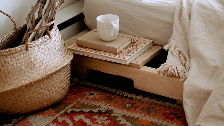 neutral items with red rug