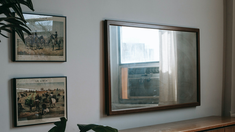 framed art with horses and cattle