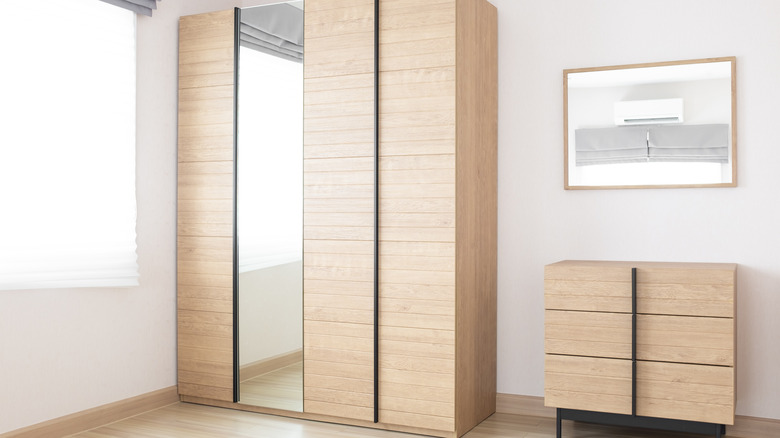 wooden storage wardrobe with mirror