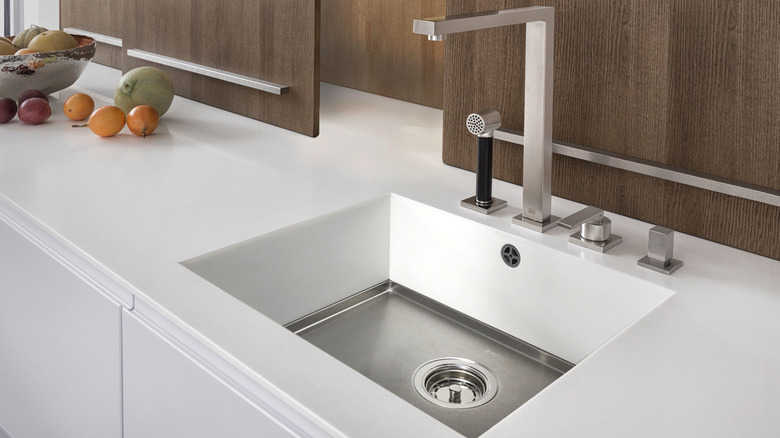 clean kitchen sink with white basin