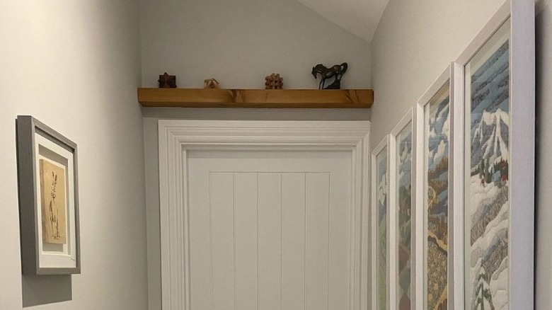 Hallway with shelf above door