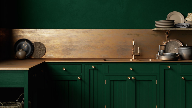 Copper countertop in green kitchen