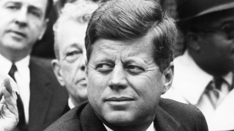 President Kennedy watching ball game 