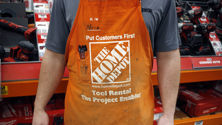 home depot employee in smock 