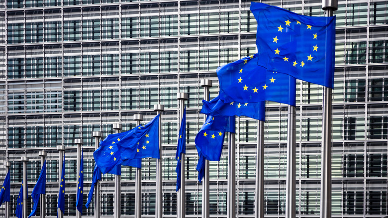 EU Flags in front skyscraper