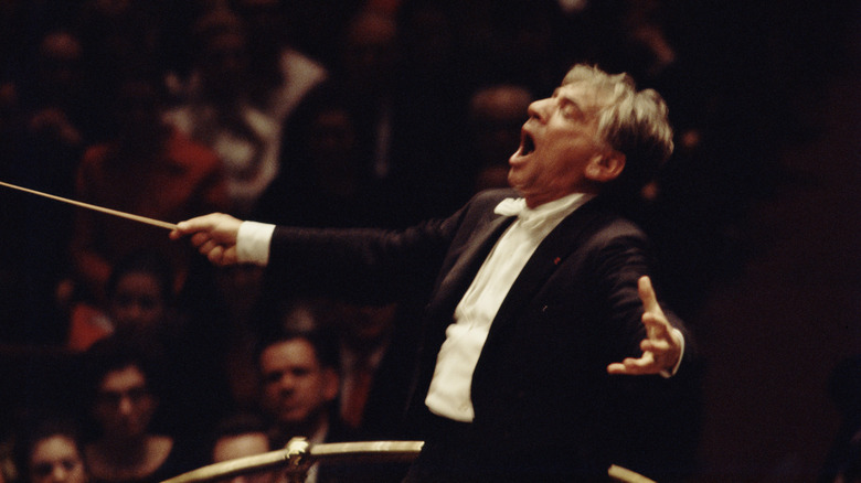 Leonard Bernstein conducting an orchestra