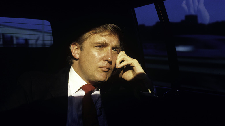 Young Donald Trump in his limo