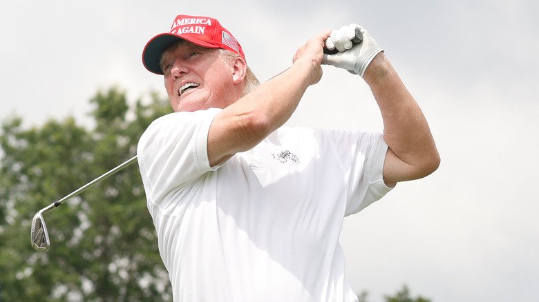 Donald Trump playing golf 