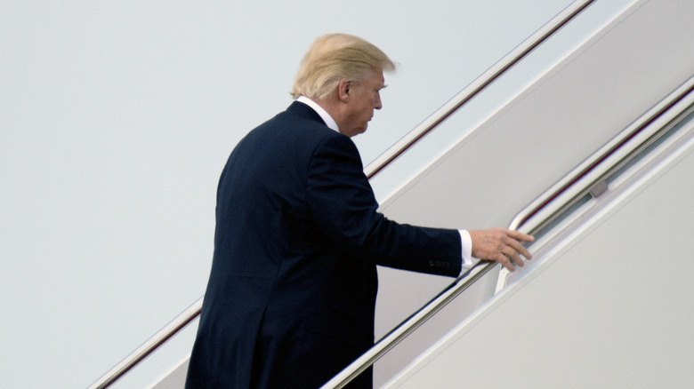 Donald Trump boarding a plane