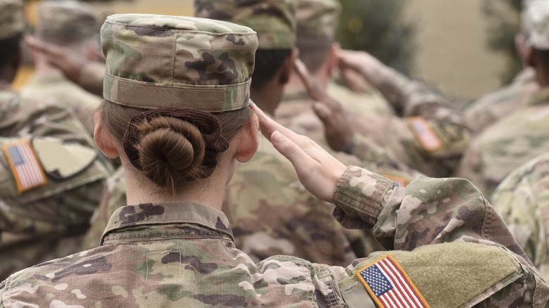 U.S. military saluting in group