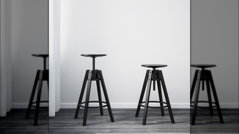 Two black IKEA stools