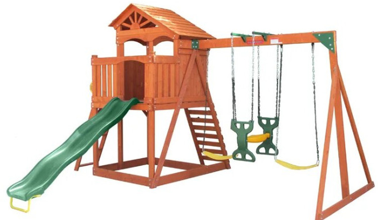 wooden play set with swings