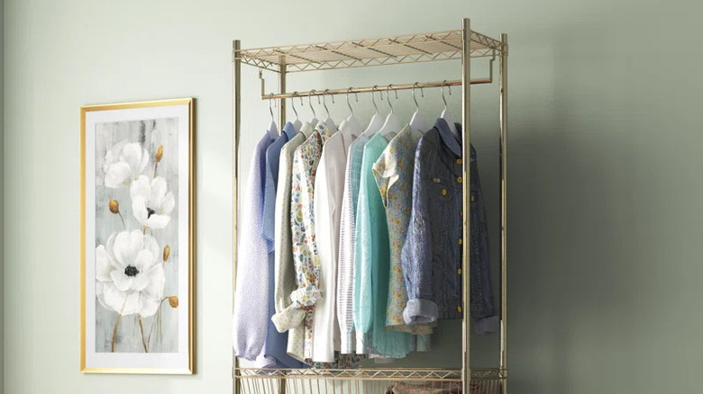 wardrobe rack with clothes