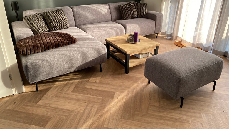 living room with herringbone floor