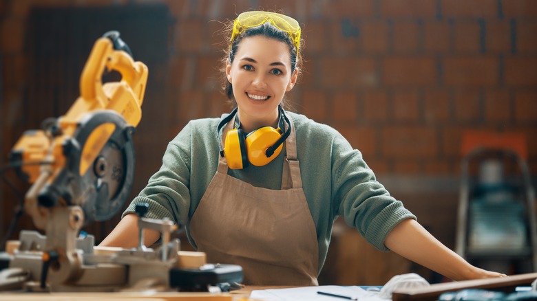 Person standing in front of workbench