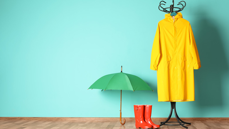 rain jacket, boots, and umbrella