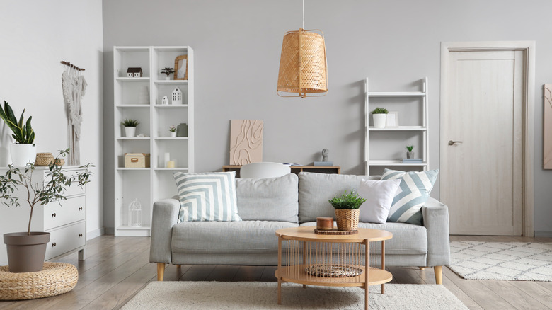 A living room with gray walls