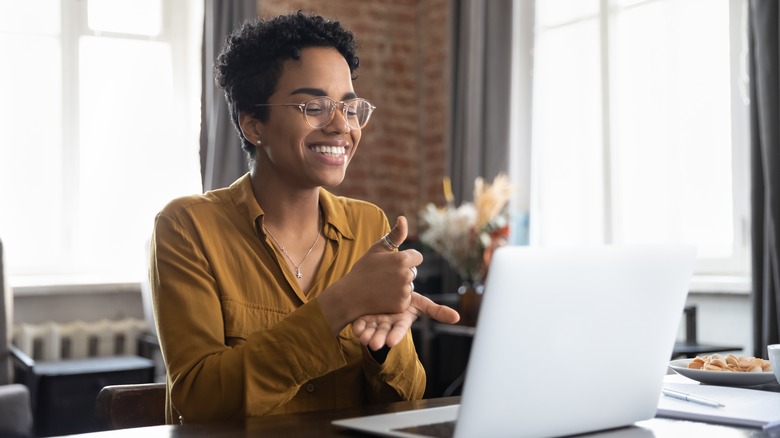 Smiling woman working at desk