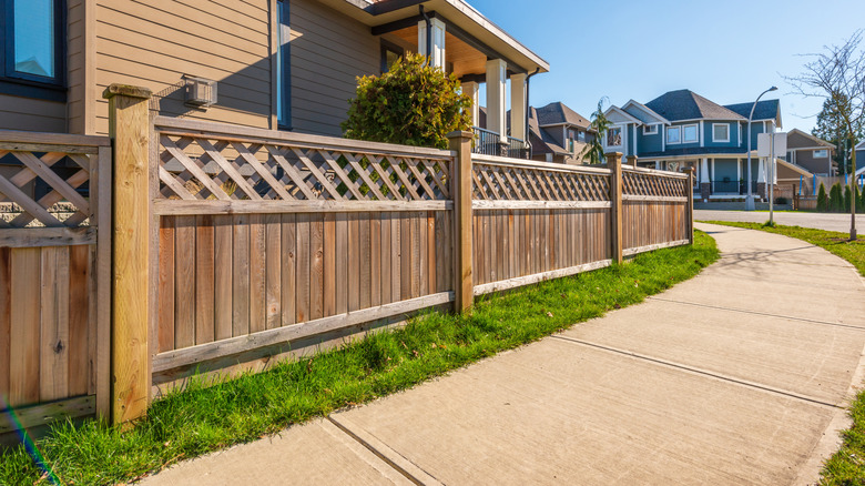 House with wooden fence