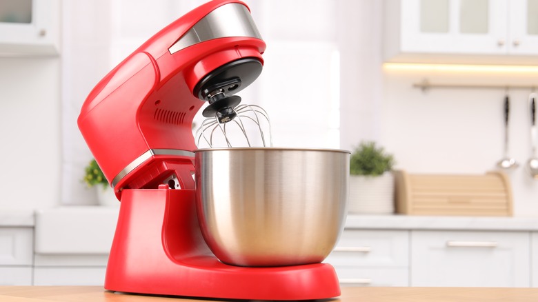 red stand mixer on countertop