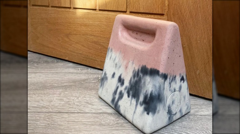 Colorful concrete wedge doorstops