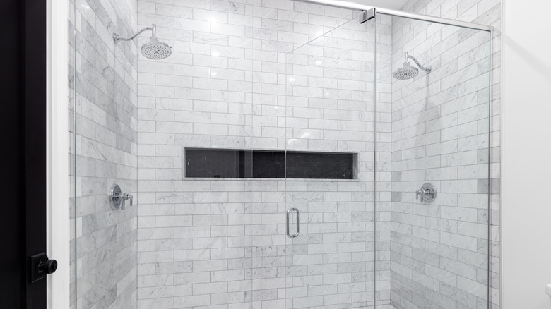 Luxury double shower with marble tiles