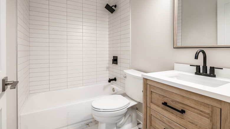 Bathroom with bathtub and shower