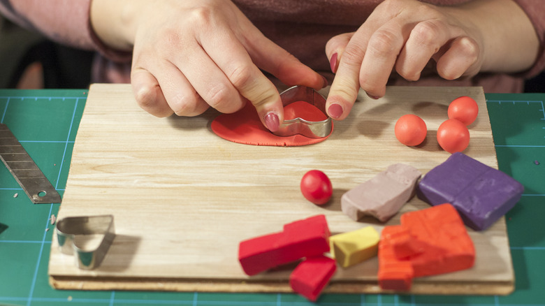 woman working with polymer clay