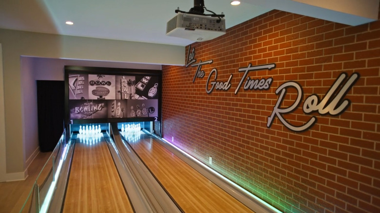 A basement bowling alley with two lanes