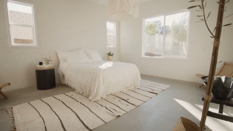 An all-white minimalist bedroom from Rock the Block