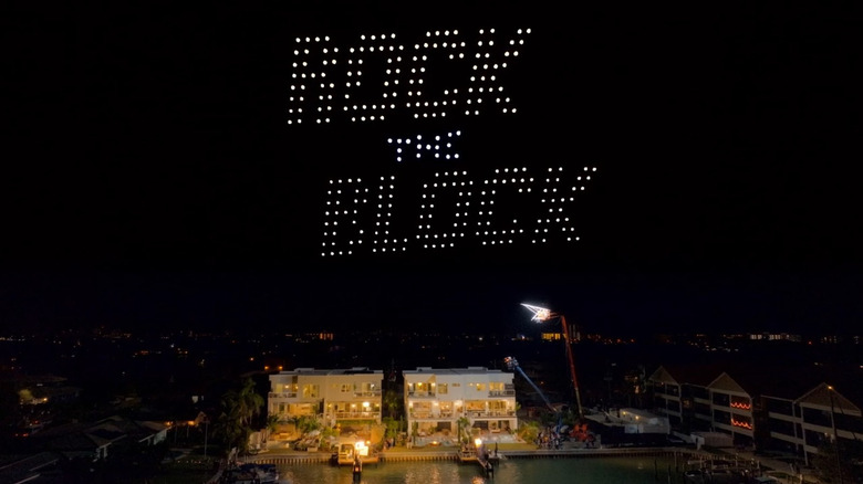 Drones flying above the Rock the Block houses