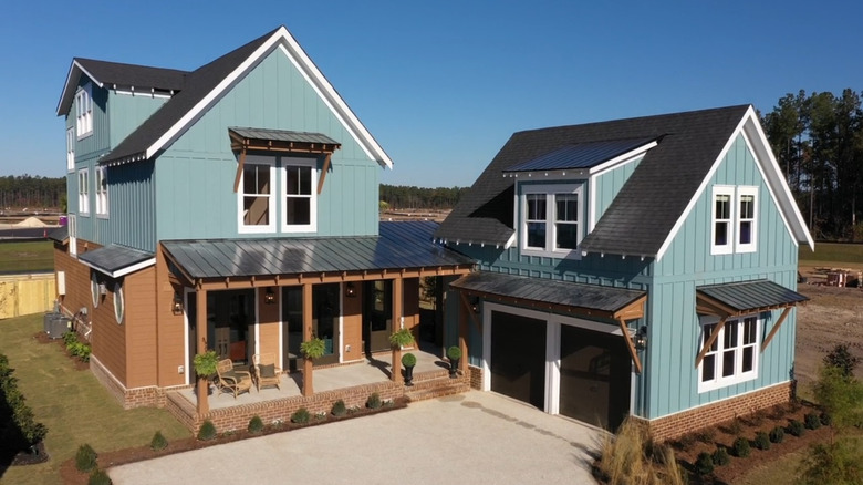 Rock the Block Home with bright blue exterior