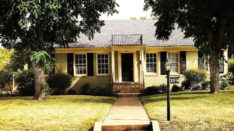 Guest house with black shutters