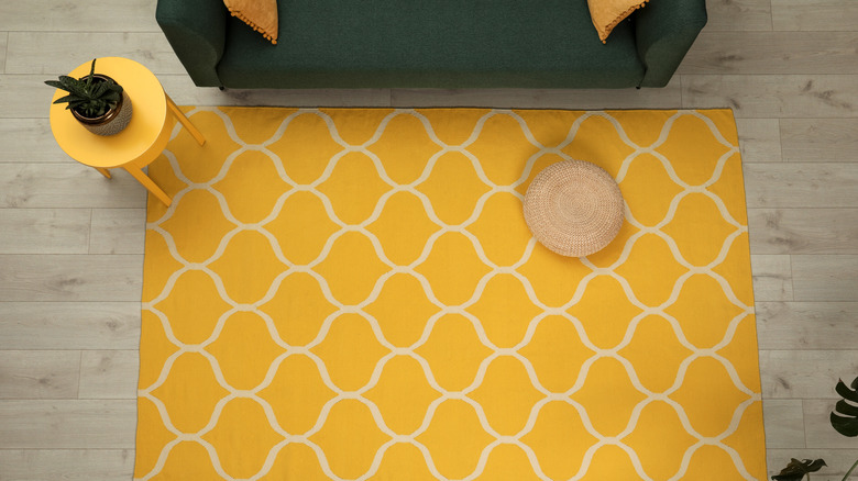 A room with yellow carpet 