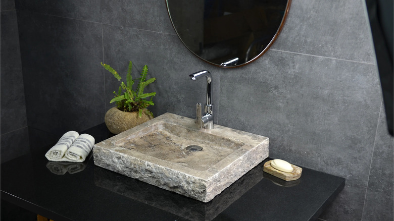 stone sink in zen bathroom