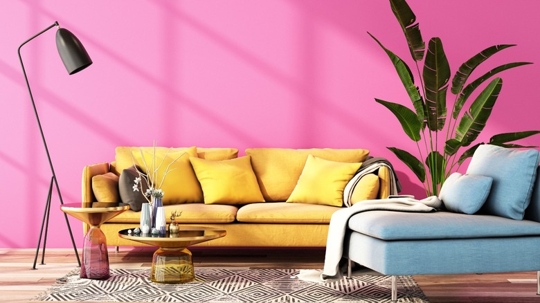 Pink room with yellow sofa