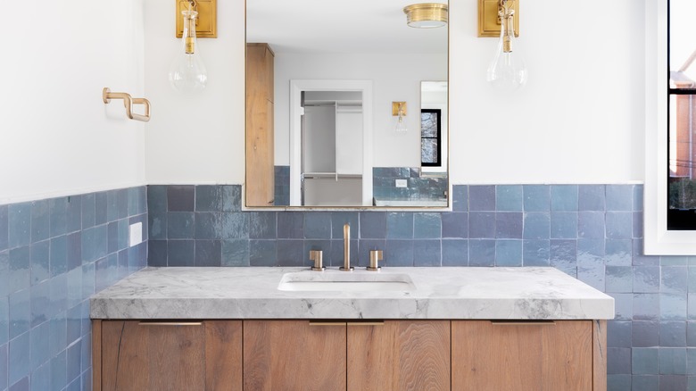 Blue tiled bathroom