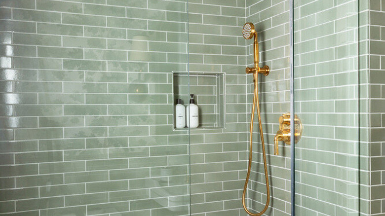 Modern bathroom with green tile