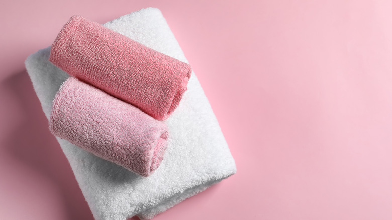 pink rolled towels