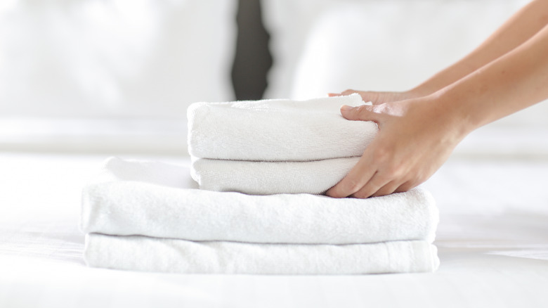 These Bath Towel Folding Tips From TikTok Will Keep Your Space So Organized