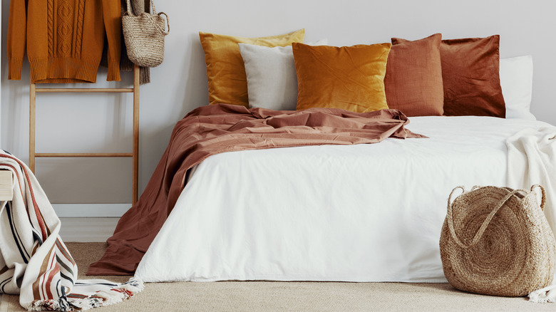 Bed with velvet pillows