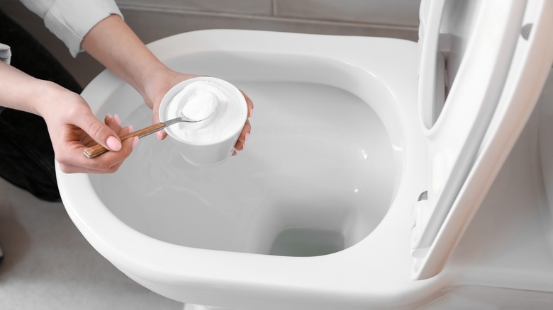 Putting baking soda in toilet