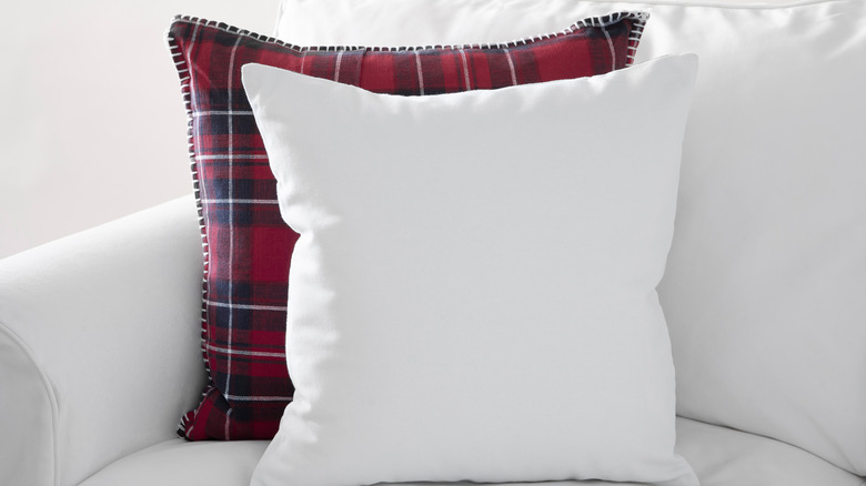 red tartan and white throw pillows