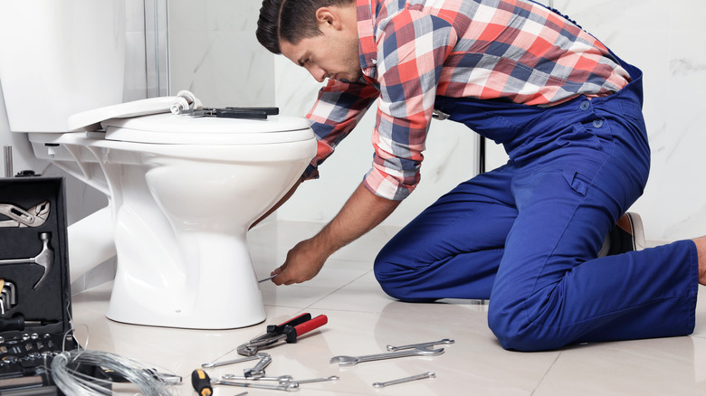 Bolting toilet to the floor