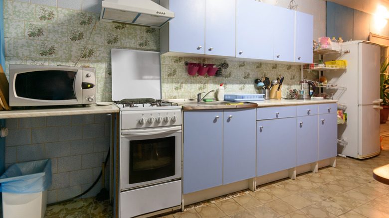 Old kitchen worn out tiles